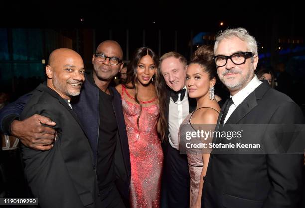 Rodney McMillian, Mark Bradford, Naomi Campbell, François-Henri Pinault, Salma Hayek Pinault, wearing Gucci, and Alfonso Cuarón, wearing Gucci,...