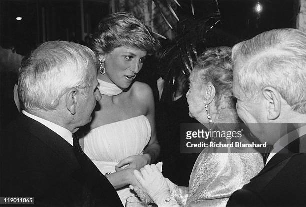 Diana, Princess of Wales meets American actress Lillian Gish and director Lindsay Anderson at the Cannes Film Festival in France, May 1987. Anderson...