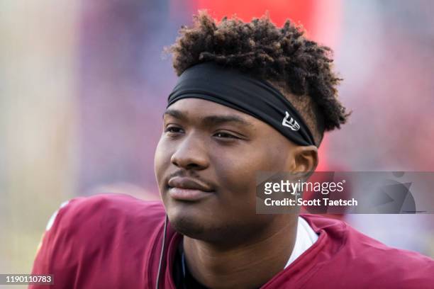 Dwayne Haskins of the Washington Redskins looks on from the sidelines after being injured during the second half of the game against the New York...