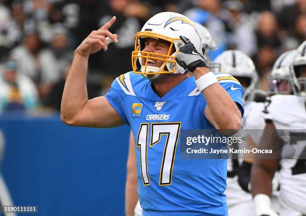 Quarterback Philip Rivers of the Los Angeles Chargers gestures as he can't hear the play call because of noise in the second half of the game against...