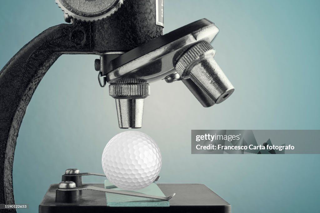 Microscope Ball Design Microscope With Golf Ball High-Res Stock Photo - Getty Images