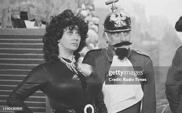 Comedian Spike Milligan And Actress Julia Breck In A Scene From News comedian-spike-milligan-and-actress-julia-breck-in-a-scene-from-news