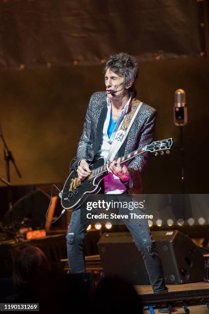 Ronnie Wood performs on stage at Symphony Hall on November 25, 2019 in Birmingham, England.