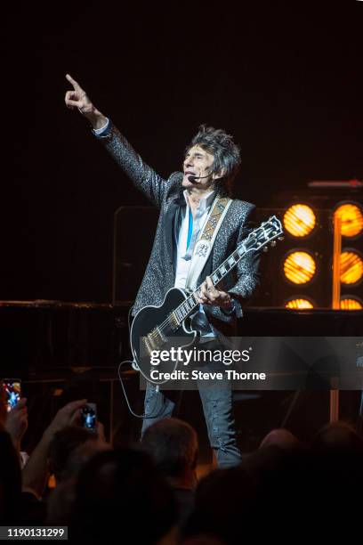 Ronnie Wood performs on stage at Symphony Hall on November 25, 2019 in Birmingham, England.