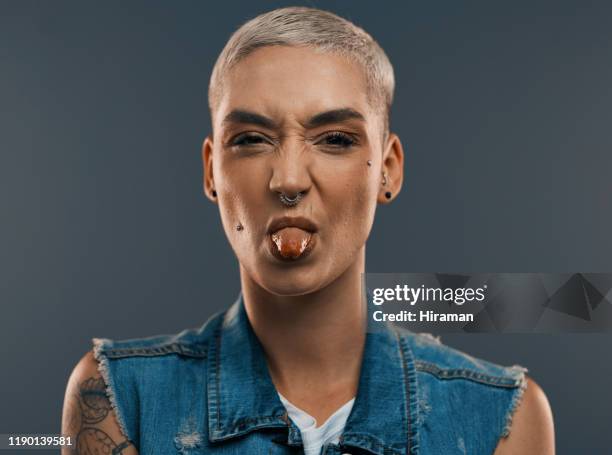letting her silly side show - sticking out tongue stock pictures, royalty-free photos & images