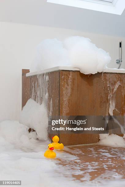 bath tub overflowing - flooded room stock pictures, royalty-free photos & images