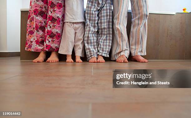 familys feet in bathroom - pyjamas stock pictures, royalty-free photos & images