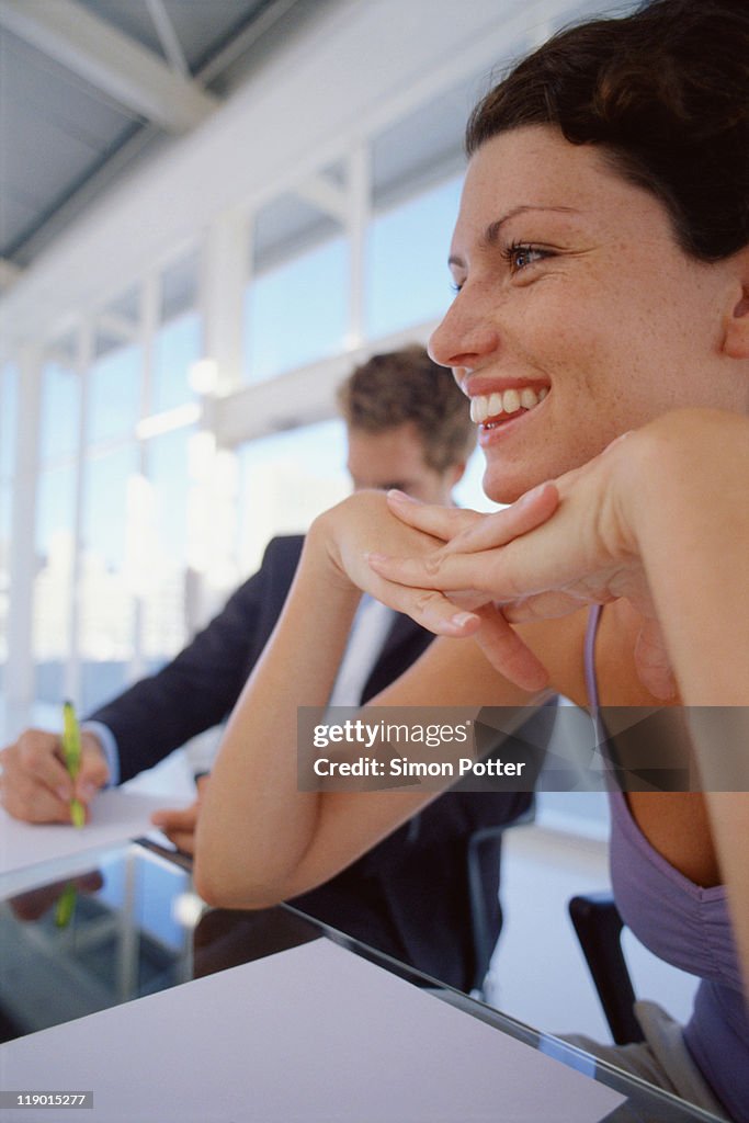 Businesswoman sitting in meeting