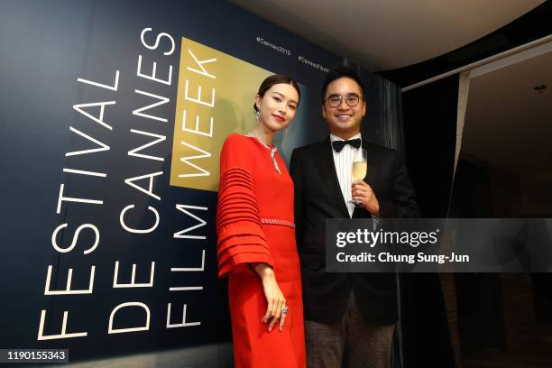 Janice Man and Adrian Cheng poses with guests at the opening ceremony of Festival de Cannes Film Week in Asia at on November 12, 2019 in Hong Kong,...