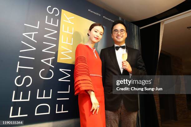 Janice Man and Adrian Cheng poses with guests at the opening ceremony of Festival de Cannes Film Week in Asia at on November 12, 2019 in Hong Kong,...