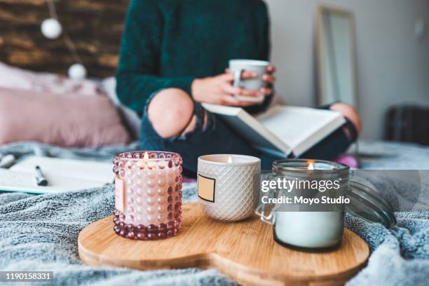 creating a relaxing environment like no other - scented candle stock pictures, royalty-free photos & images