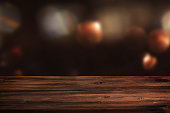Dark abstract background with wooden table
