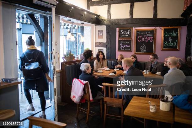 Former Conservative MP and Liberal Democrat member Heidi Allen speaks with members of the public in a coffee shop as she campaigns for Liberal...