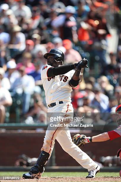 Bill Hall of the San Francisco Giants hits during the game against the Cincinnati Reds at AT&T Park on June 11, 2011 in San Francisco, California....