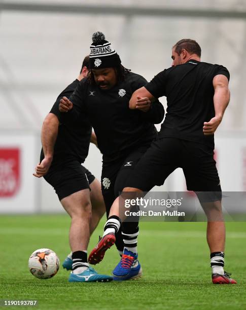 Mathieu Bastareaud of the Barbarians takes on Tyler Ardron and Craig Millar of the Barbarians at the University of South Wales Treforest Campus on...