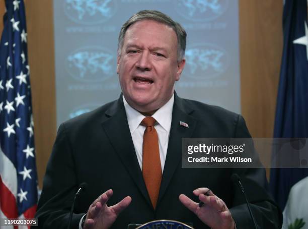 Secretary of State Mike Pompeo speaks to the media in the briefing room at the State Department, on November 26, 2019 in Washington, DC. Secretary...