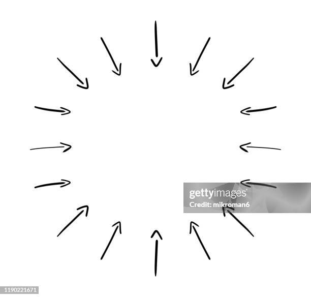 arrow pointing inwards in shape of circle - doodling stock pictures, royalty-free photos & images