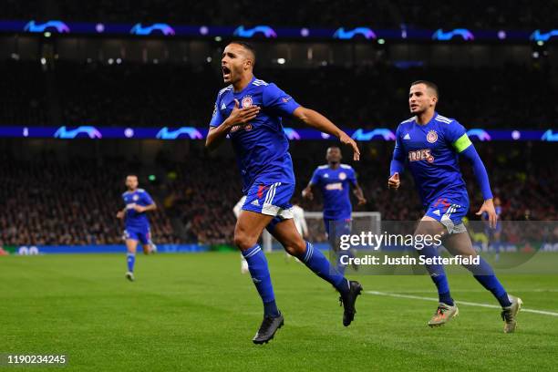 Youssef El Arabi of Olympiacos celebrates after scoring his team's first goal during the UEFA Champions League group B match between Tottenham...