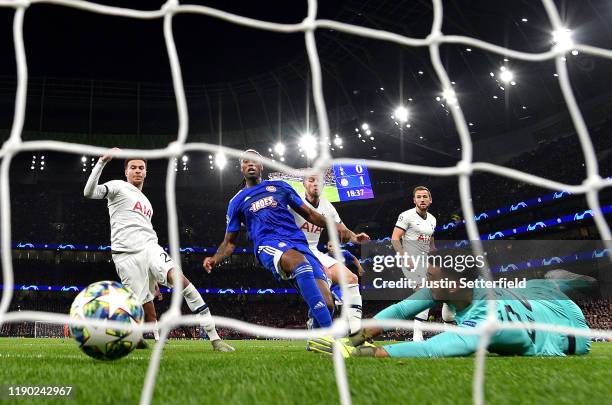 Ruben Semedo of Olympiacos scores his team's second goal past Paulo Gazzaniga of Tottenham Hotspur during the UEFA Champions League group B match...