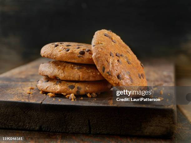 gluten free, low carbohydrate and grain free chocolate chip cookies - almond cookies stock pictures, royalty-free photos & images