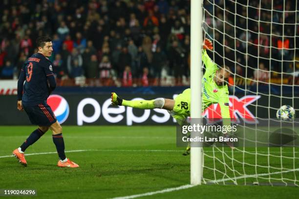 Robert Lewandowski of FC Bayern Munich scores his team's third goal during the UEFA Champions League group B match between Crvena Zvezda and Bayern...