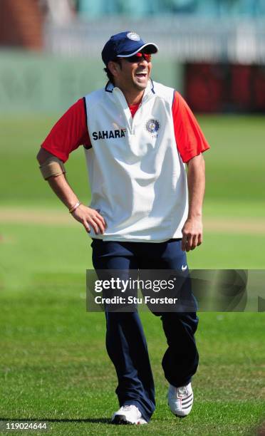 India batsman Sachin Tendulkar enjoys a joke during a game of football during a net session ahead of their tour game against Somerset at the county...