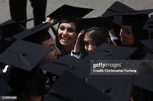 Students at the University of Birmingham take part in their degree congregations as they graduate on July 14, 2011 in Birmingham, England. Thousands...