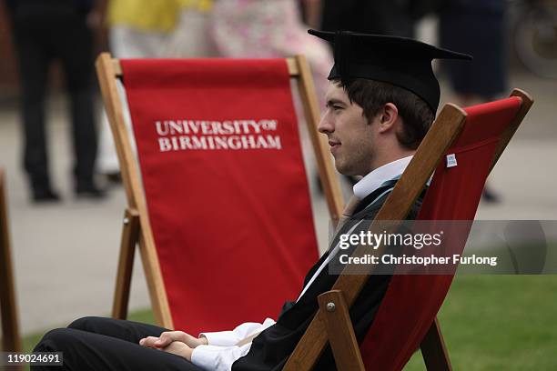 Student at the University of Birmingham relaxes before he takes part in his degree congregation as he graduates on July 14, 2011 in Birmingham,...