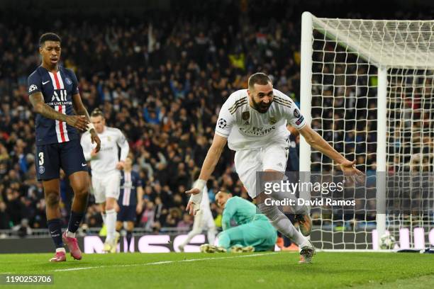 Karim Benzema of Real Madrid celebrates after scoring his team's second goal during the UEFA Champions League group A match between Real Madrid and...