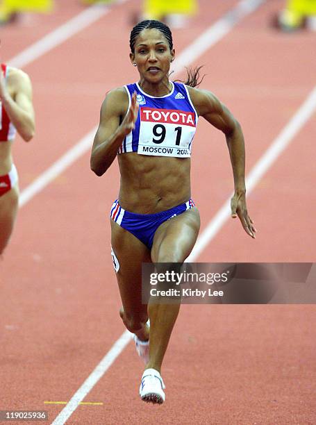 Christine Arron of France wins first-round heat of women's 60 meters in 7.16 in the IAAF World Indoor Championships in Athletics at the Olympiysky...