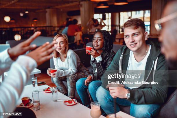 former highschool students having a coffee reunion - former friends stock pictures, royalty-free photos & images