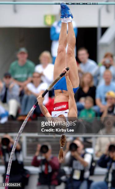 World record holder Yelena Isinbayeva of Russia cleared 14-7 1/4 in the women's pole vault qualifying to advance to the final in the IAAF World...