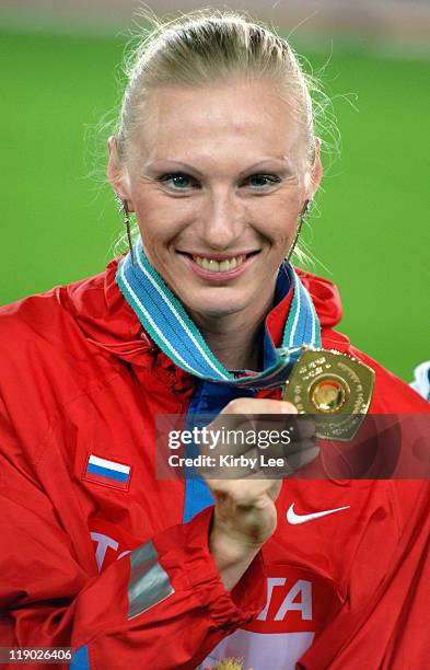 Yuliya Penchonkina of Russia poses with gold medal during the womens' 400-meter hurdle medal ceremony at the IAAF World Championships in Athletics at...