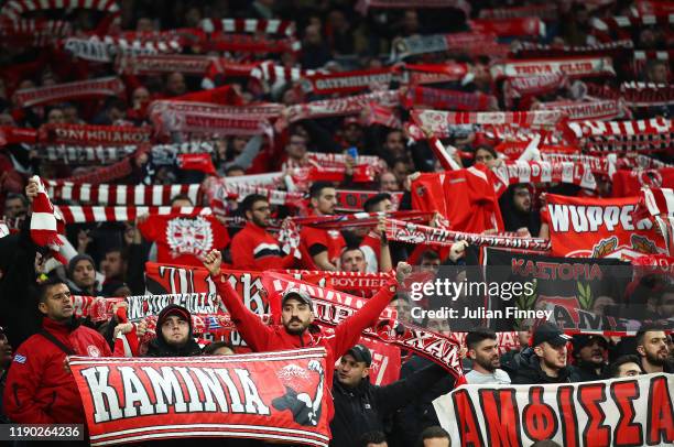 Olympiacos fans show their support during the UEFA Champions League group B match between Tottenham Hotspur and Olympiacos FC at Tottenham Hotspur...