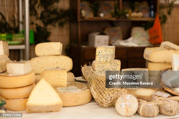cheese on a market stall - roquefort cheese stock pictures, royalty-free photos & images