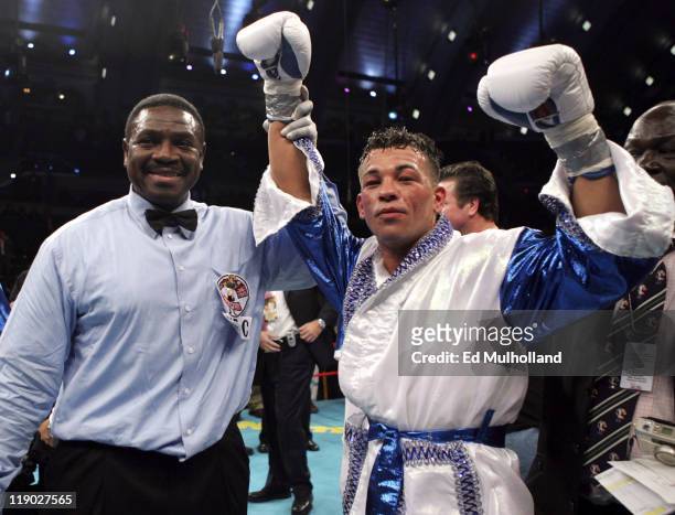 Super Lightweight Champion Arturo Gatti has his hand raised in victory following his fifth-round knockout of Jesse James Leija during their title...