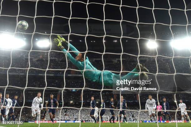 Keylor Navas of Paris Saint-Germain reaches for the ball as Gareth Bale of Real Madrid hits the post from a freekick during the UEFA Champions League...