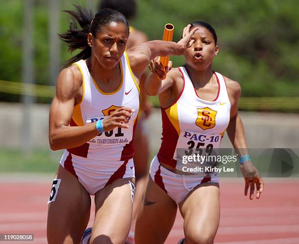 Alexis Weatherspoon of USC takes handoff from Tracee Thomas on the anchor of the women's 400-meter relay in the Pacific-10 Conference Track & Field...