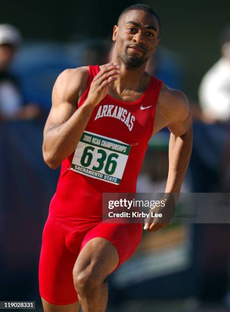 Tyson Gay of Arkansas wins first-round heat of the 200 meters in 20.42 in the NCAA Track & Field Championships at Sacramento State's Hornet Stadium...