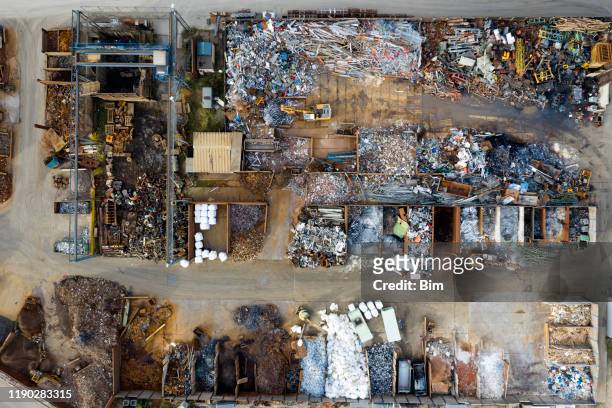 metal recycling yard from above - building supplies stock pictures, royalty-free photos & images