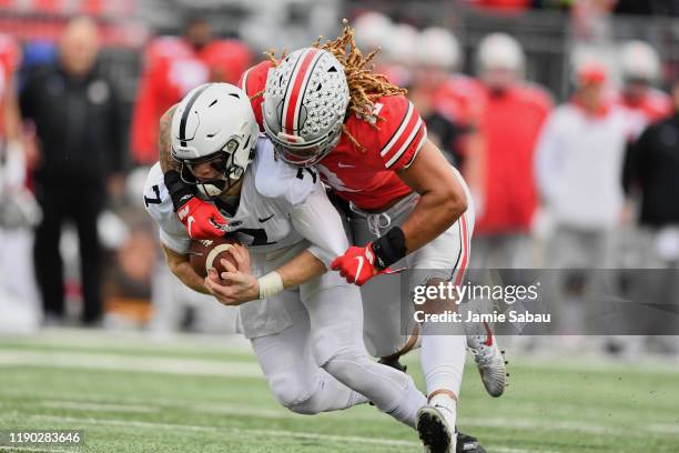 Chase Young of the Ohio State Buckeyes chases down the ballcarrier against the Penn State Nittany Lions at Ohio Stadium on November 23, 2019 in...