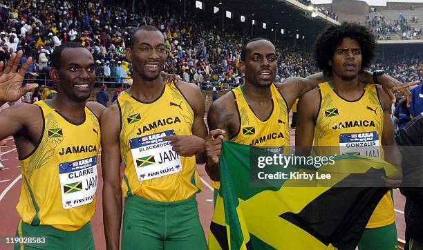 The Jamaica men's 4 x 400-meter relay of Davian Clarke, Michael Blackwood, Sanjay Ayre and Jermaine Gonzales celebrate victory in the USA vs. The...