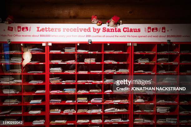 Picture taken on December 2, 2019 shows a view of Santa Claus' post office at Santa Claus Village near Rovaniemi, Finnish Lapland. - Rovaniemi's...