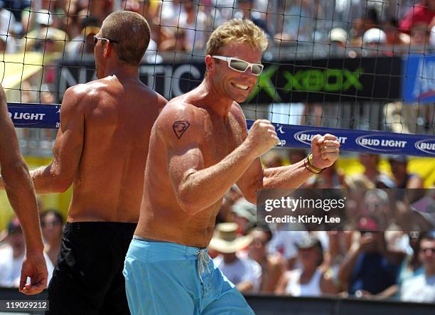 Casey Jennings celebrates a point during the AVP Hermosa Beach Open in Hermosa Beach, Calif. On Saturday, July 23, 2005.