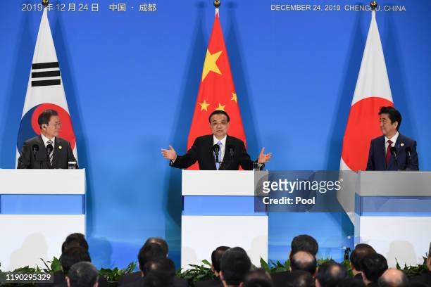 China's Premier Li Keqiang speaks at a joint press conference at the 8th trilateral leaders' meeting between China, South Korea and Japan in Chengdu,...