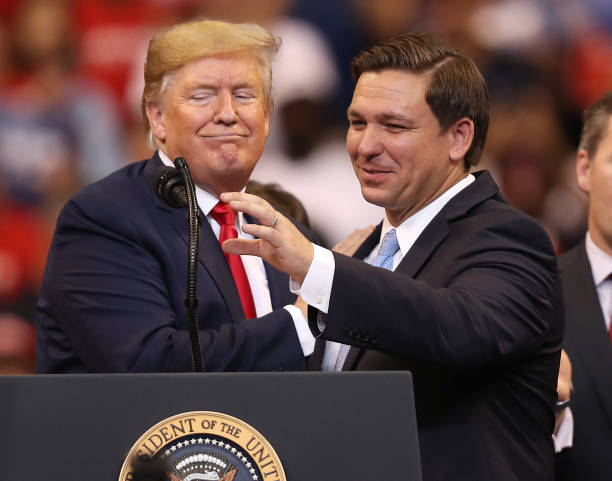 President Donald Trump introduces Florida Governor Ron DeSantis during a homecoming campaign rally at the BB&T Center on November 26, 2019 in...