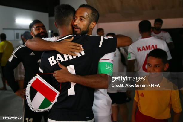 Mohamed Aljasmi of United Arab Emirates UAE hugs Walid Mohammad in the tunnel prior to the FIFA Beach Soccer World Cup Paraguay 2019 group C match...