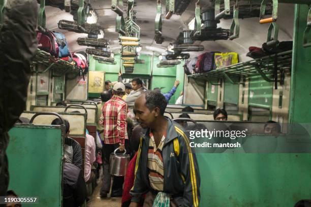 passengers inside local train of indian railway - mumbai train stock pictures, royalty-free photos & images