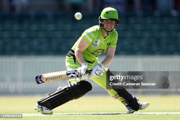 Alex Blackwell of the Thunder bats during the Women's Big Bash League match between the Sydney Thunder and the Melbourne Stars at Manuka Oval on...