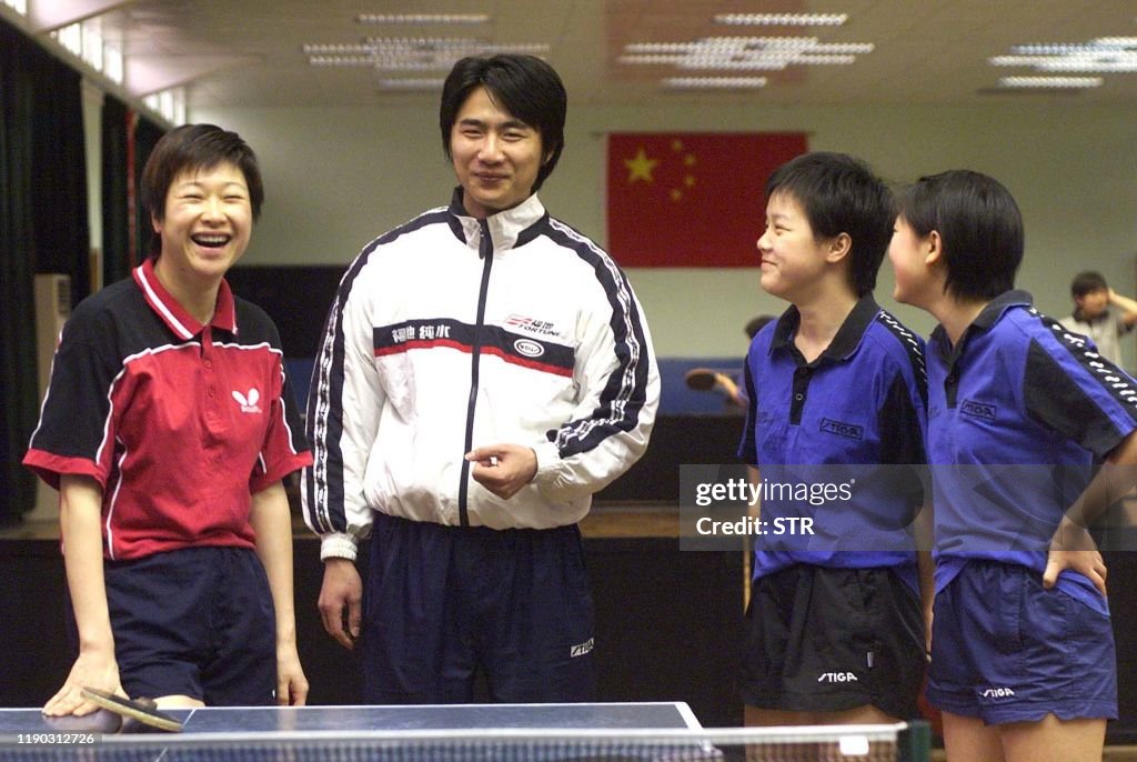 TABLE TENNIS-CHEN JING-AND COACH